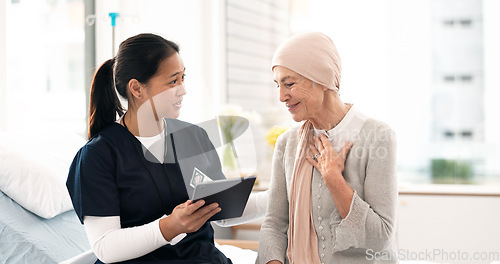 Image of Tablet, nurse and woman with cancer patient, elderly and hospital consultation for wellness. Tech, happy and medical professional with sick senior person coughing for advice, healthcare or support