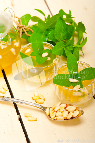 Image of Arab traditional mint and pine nuts tea