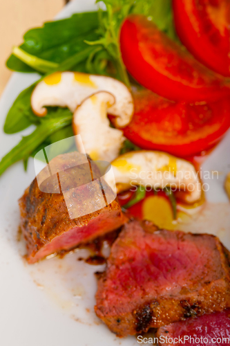 Image of beef filet mignon grilled with vegetables