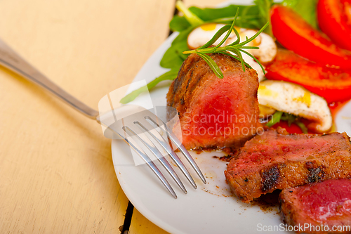 Image of beef filet mignon grilled with vegetables