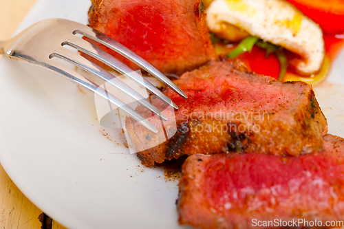 Image of beef filet mignon grilled with vegetables