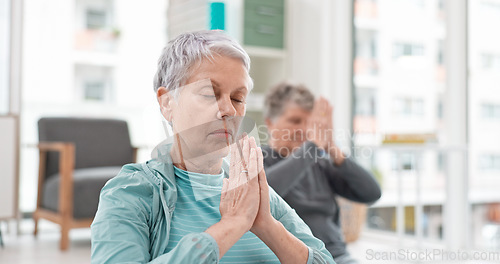 Image of Senior people, yoga class and coach meditation, prayer and peace hands for exercise, holistic wellness and mindfulness. Spiritual workout, group and calm elderly women, clients and personal trainer