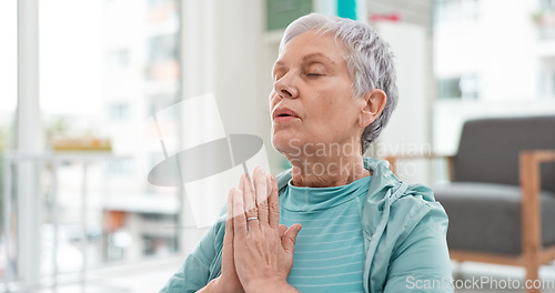 Image of Yoga, namaste meditation and woman breathing for mindfulness, senior exercise or healing at home. Face of healthy old lady, breathe and meditate with prayer hands for zen, wellness and focus on peace