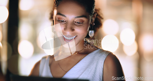 Image of Screen, office and face of black woman at night working online, reading internet website and do research. Business, technology and female worker networking on tablet, computer or laptop in workplace