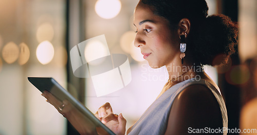 Image of Black woman, night business and tablet for social networking connection, online management and media research. Young female worker, digital technology and data analysis, planning or website analytics