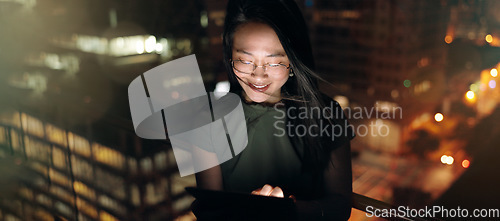Image of Woman, digital tablet and rooftop at night in city for social media, research and networking on urban background. Business woman, balcony and online search by entrepreneur working late in New York