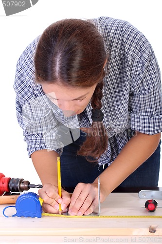 Image of woman carpenter at work 