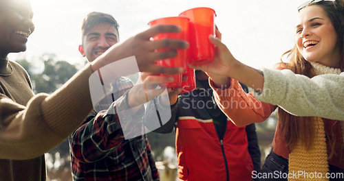 Image of Friends, camping and toast drink outdoor for celebration, party and holiday together with smile. Happy students, group and cheers for alcohol, festival or event in sunshine on vacation in countryside