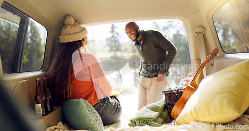 Image of Winter and a couple in a car for a road trip, date or watching the view together. Happy, travel and back of a man and woman with an affection in transport during a holiday or camping in nature