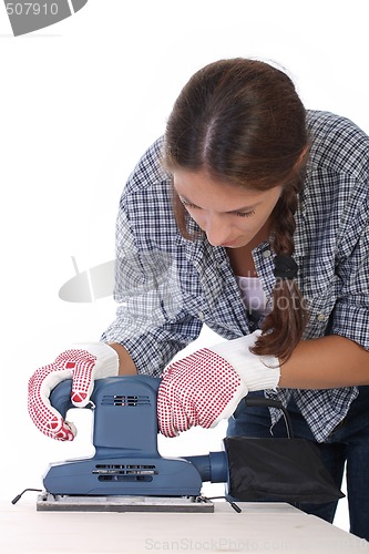 Image of woman carpenter at work