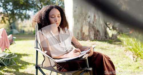 Image of Camping, morning and a woman writing in a book for travel notebook, journal or summer memory. Relax, reading and a girl or person in a chair while on a camp or document for holiday goals in nature