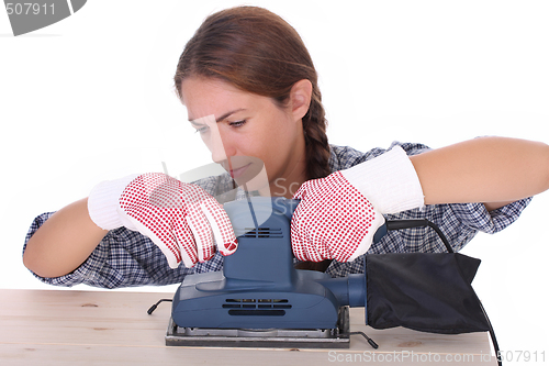 Image of woman carpenter at work