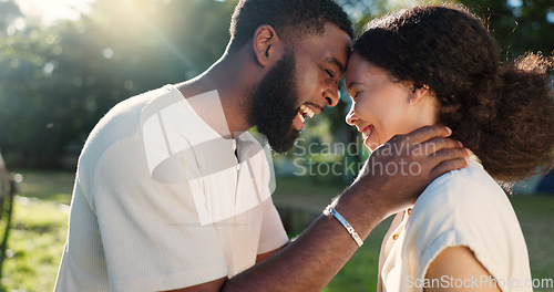 Image of Love, nature and couple dancing with an intimate moment on a romantic date in a garden on holiday. Happy, smile and African young man and woman moving with affection in park on weekend trip together.