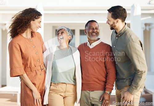 Image of Happy family, parents and couple at a new home due to real estate laughing together and bonding as love or care. Outdoor, man and woman with elderly people with happiness for quality time at a house