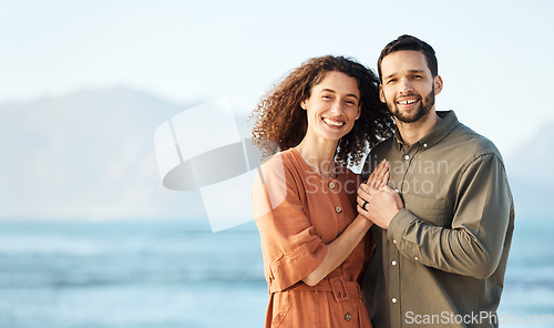 Image of Couple, outdoor and portrait with love, marriage and happy from travel by the ocean. Smile, hug and gratitude from a woman and man together with care on vacation and relax on holiday in summer