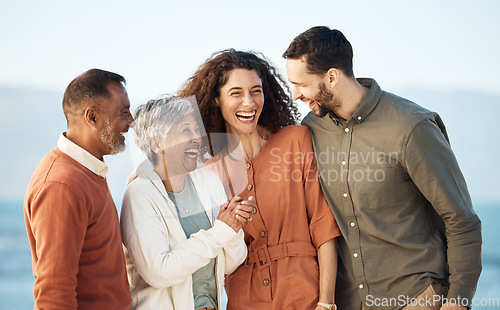 Image of Funny, happy and vacation with big family at beach for summer travels, care and support. Love, smile and happiness with senior parents and couple laughing in nature for holiday, relax and bonding