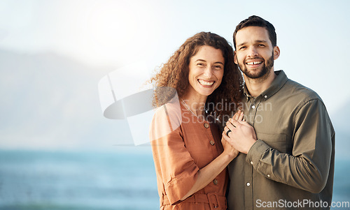 Image of Couple, hug and happiness at the beach, love and care with bonding, travel and trust in a marriage. Life partner, mockup space and adventure in nature, people on holiday with respect and romance
