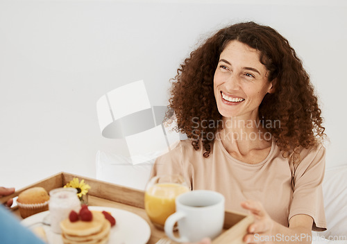 Image of Breakfast, morning and woman in bed for birthday, anniversary celebration and romantic gesture. Relationship, love and happy couple with healthy food on tray for wellness, nutrition and surprise