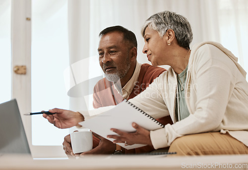 Image of Senior couple, tax and laptop and home with documents, budget and audit for wealth, compliance or investment. Mature man, woman and paperwork with point, financial strategy and thinking in retirement