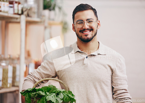 Image of Man, shop and small business for portrait, vegetables and happy for service, help and sales with pride at company. Young entrepreneur, store and basket for product, leaves and groceries in Rome