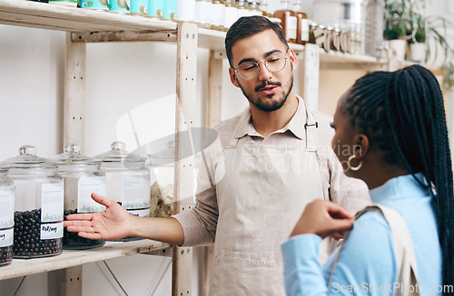 Image of Supermarket, grocery store and manager with woman for help, assistance and service in eco friendly market. Small business, organic shop and man with customer for groceries, product and food choice