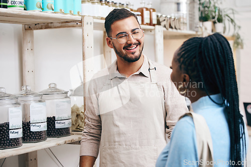Image of Grocery store, staff and inventory conversation with a smile at a sustainable small business. Workers, communication and retail management planning in eco friendly and fair trade shop with employees