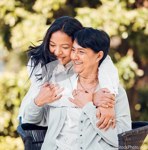 Image of Mature mother, daughter and hug in garden with love on mothers day or woman bonding with care for mom in retirement. Happy, family and embrace outdoor, backyard or together on holiday or vacation