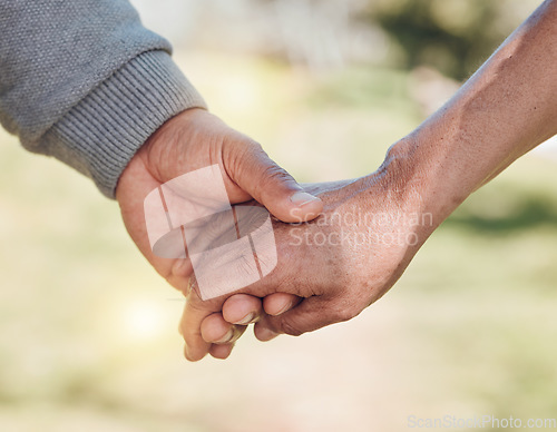 Image of Holding hands, closeup and support, trust and love with people outdoor, solidarity and care while in nature. Healthy relationship, bond and wellness, commitment and comfort with peace and partner