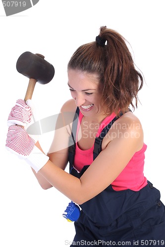 Image of woman with black rubber mallet 