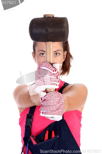 Image of woman with black rubber mallet 