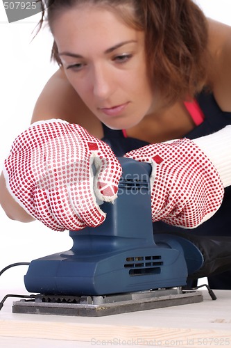 Image of woman carpenter at work 