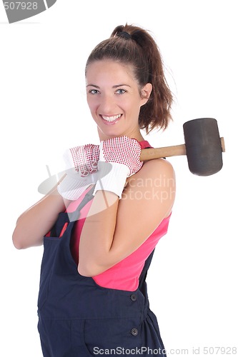 Image of woman with black rubber mallet 