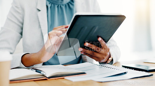 Image of Black woman, tablet and smile for social media, browsing or business research at the office desk. Happy African female working on touchscreen scrolling and smiling for networking or digital marketing