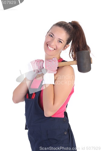 Image of woman with black rubber mallet 