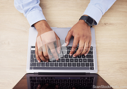 Image of Laptop, above and hands of business person in office for networking, website and research. Cybersecurity, programming and worker on computer typing for information technology, coding software or data