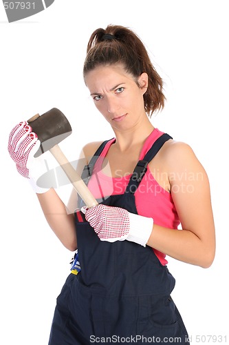 Image of woman with black rubber mallet 