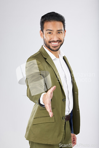 Image of Business man, handshake and offer for interview, introduction and welcome to deal, success or thank you in studio. Professional person shaking hands in POV meeting and portrait on a white background