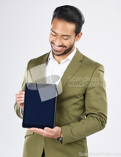 Image of Happy asian man, tablet mockup and screen in advertising against a white studio background. Businessman smile with technology display or app in marketing, advertisement or branding on mock up space