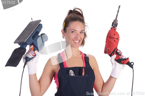 Image of Beauty woman with auger and sander 