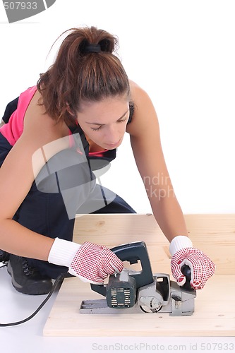 Image of woman carpenter at work