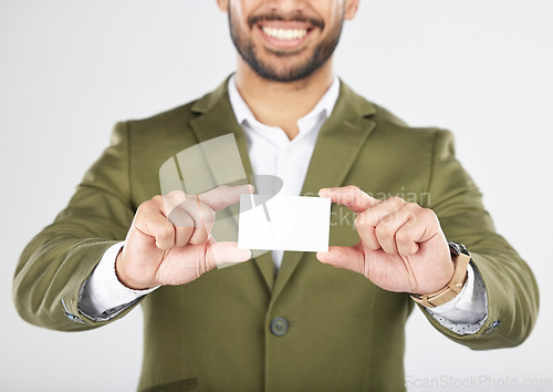 Image of Happy man, hands and business card in advertising, marketing or branding against a white studio background. Closeup of businessman with paper or poster for contact information or services on mockup