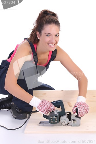 Image of woman carpenter at work