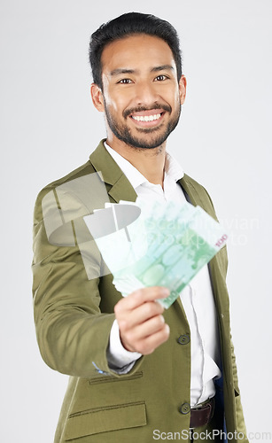 Image of Business man, offer and money for financial success, bonus and investment, profit or loan on a white background. Professional asian person or winner in portrait for savings, cash or lottery in studio