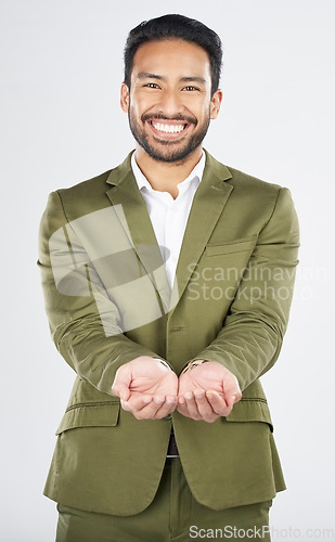 Image of Hands, open and portrait of business man in studio for charity, begging for support and help. Happy, corporate and person with gesture for donation, financial aid and investment on white background