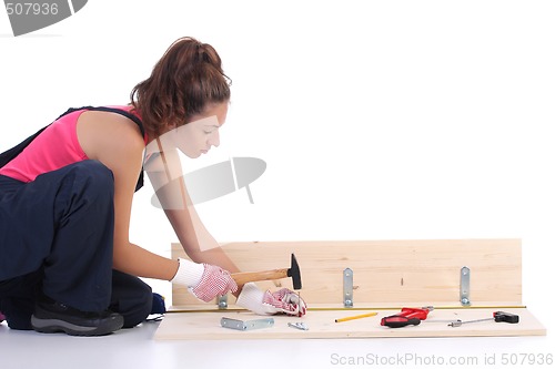 Image of woman carpenter at work 