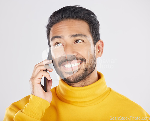 Image of Phone call, happy and face of man in studio for conversation, chatting and communication. Networking, mockup and isolated person on smartphone for talking, speaking and contact on white background
