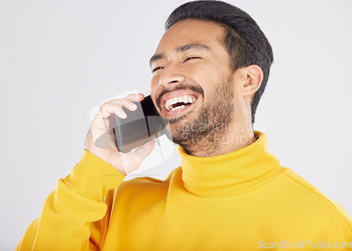 Image of Phone call, happy and man laugh in studio for funny conversation, chatting and communication. Networking, mockup and isolated person on smartphone talking, speaking and share joke on white background