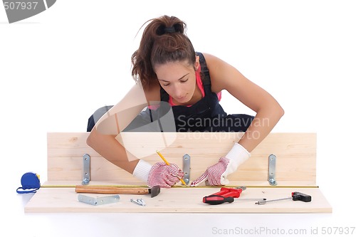 Image of woman carpenter at work 