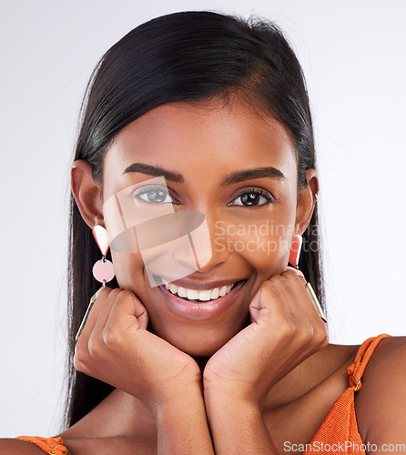 Image of Beauty, smile and portrait of studio woman with aesthetic facial makeup, natural skincare shine or self care wellness. Cosmetology, face or Indian model happy anti aging cosmetics on white background