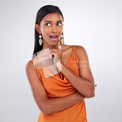 Image of Surprise, fashion and beauty with woman and thinking in studio for news, announcement and giveaway. Deal, shocked and wow with face of person on white background for secret, discount and sale